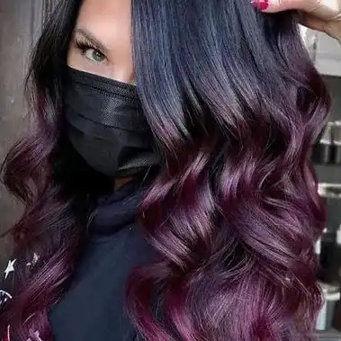 Deep plum hair color styling